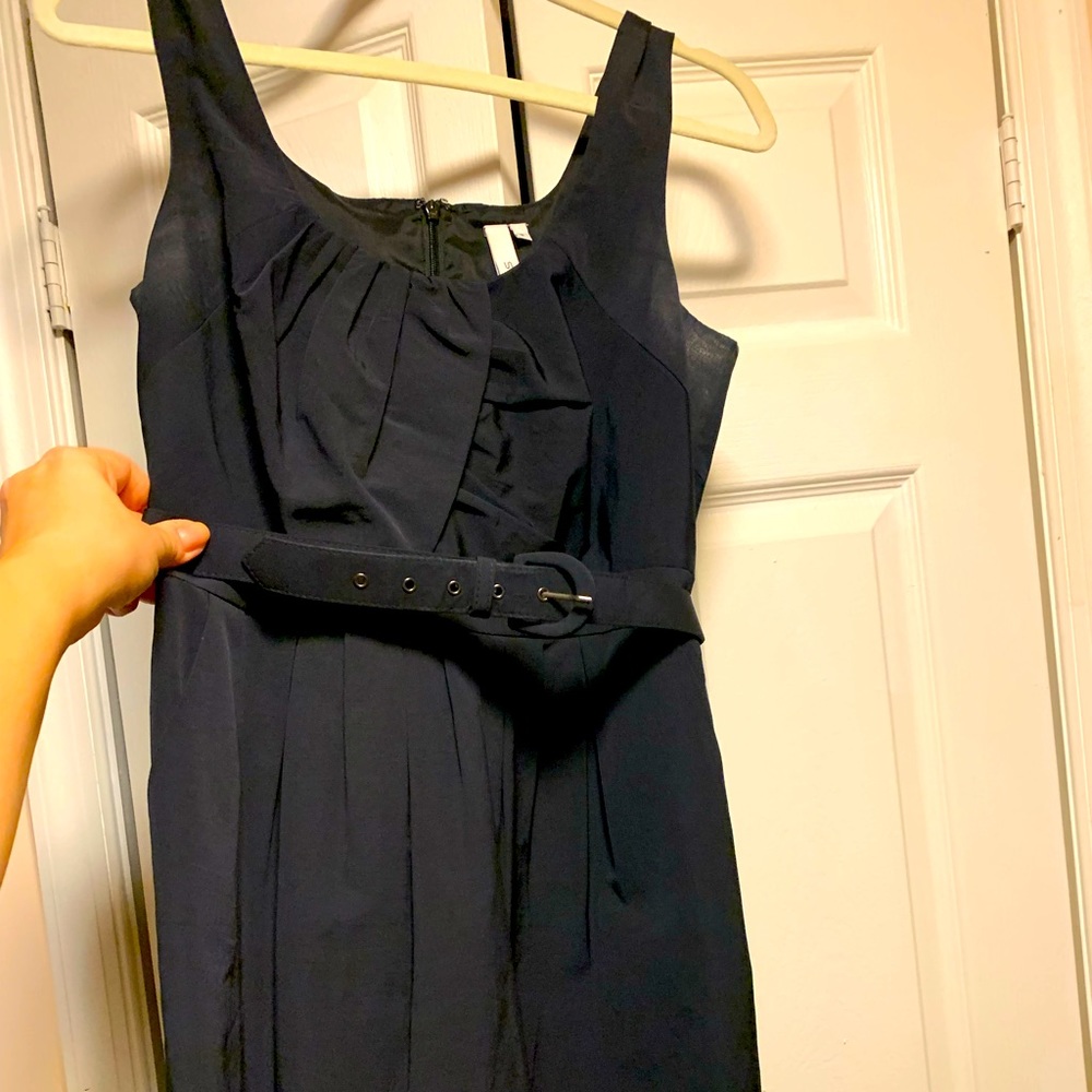 Navy cocktail dress with belt.